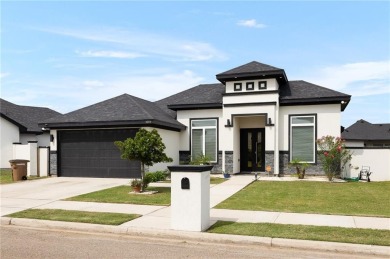 Experience the pinnacle of upscale living in this exquisite on Los Lagos Golf Club in Texas - for sale on GolfHomes.com, golf home, golf lot