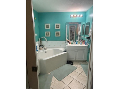 Beautifully Furnished End Unit with Lake Views! Discover the on Cypress Woods Golf and Country Club in Florida - for sale on GolfHomes.com, golf home, golf lot