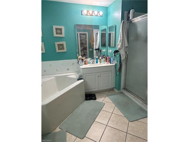 Beautifully Furnished End Unit with Lake Views! Discover the on Cypress Woods Golf and Country Club in Florida - for sale on GolfHomes.com, golf home, golf lot