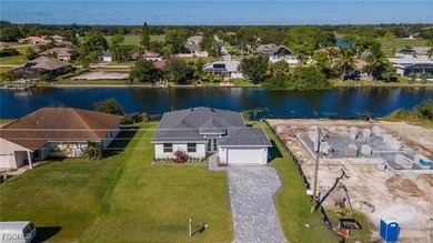Beautiful waterfront single-family home - take advantage of an on Burnt Store Golf Club in Florida - for sale on GolfHomes.com, golf home, golf lot
