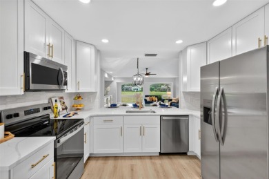 Stunning remodel with golf course frontage in Meadows. New roof on The Meadows Golf and Country Club in Florida - for sale on GolfHomes.com, golf home, golf lot