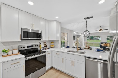 Stunning remodel with golf course frontage in Meadows. New roof on The Meadows Golf and Country Club in Florida - for sale on GolfHomes.com, golf home, golf lot