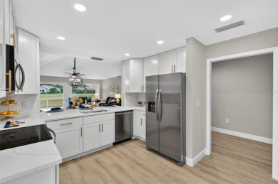 Stunning remodel with golf course frontage in Meadows. New roof on The Meadows Golf and Country Club in Florida - for sale on GolfHomes.com, golf home, golf lot