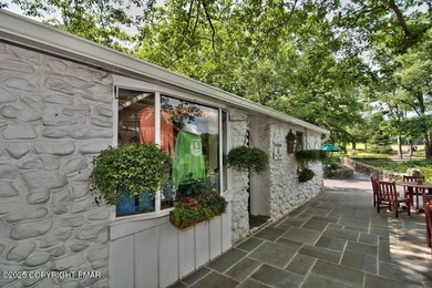 Move right in and enjoy this fully furnished, beautifully on Buck Hill Golf Club  in Pennsylvania - for sale on GolfHomes.com, golf home, golf lot