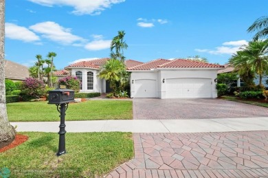 Welcome to this Spectacular Golf Course Pool Home making its on Weston Hills Country Club in Florida - for sale on GolfHomes.com, golf home, golf lot