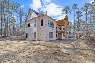 Discover the pinnacle of luxury living in this exceptional new on Reynolds Lake Oconee - The Oconee in Georgia - for sale on GolfHomes.com, golf home, golf lot