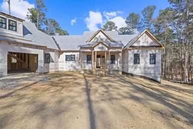 Discover the pinnacle of luxury living in this exceptional new on Reynolds Lake Oconee - The Oconee in Georgia - for sale on GolfHomes.com, golf home, golf lot