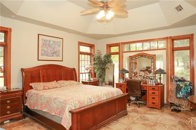 Welcome to 10812 Bay Ridge Drive -- a beautiful two-story home on Lions Den Golf Club in Arkansas - for sale on GolfHomes.com, golf home, golf lot