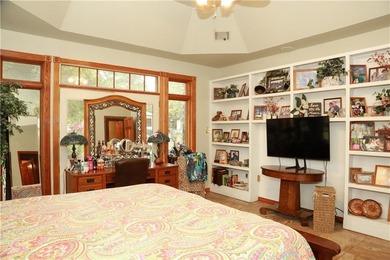 Welcome to 10812 Bay Ridge Drive -- a beautiful two-story home on Lions Den Golf Club in Arkansas - for sale on GolfHomes.com, golf home, golf lot