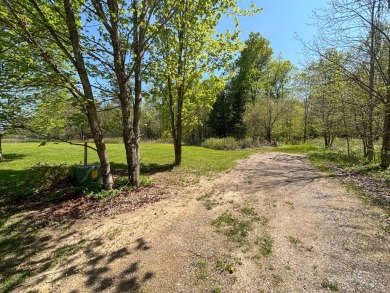 Prime location alert! Nestled on a one-acre lot bordering the on Maplewood Golf Course in Wisconsin - for sale on GolfHomes.com, golf home, golf lot