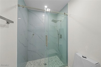 Completely Remodeled Luxury Home in Premier 55+ Golf Community on Sabal Springs Golf and Racquet Club in Florida - for sale on GolfHomes.com, golf home, golf lot