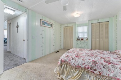MOVE-IN READY! 2 BED/2 BATH COZY RETREAT - TWO FLORIDA ROOMS - on Bay Tree Golf Course in Florida - for sale on GolfHomes.com, golf home, golf lot