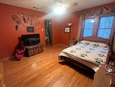 Welcome to 10812 Bay Ridge Drive -- a beautiful two-story home on Lions Den Golf Club in Arkansas - for sale on GolfHomes.com, golf home, golf lot