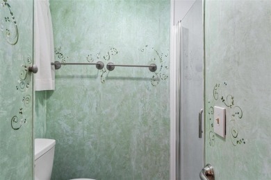 MOVE-IN READY! 2 BED/2 BATH COZY RETREAT - TWO FLORIDA ROOMS - on Bay Tree Golf Course in Florida - for sale on GolfHomes.com, golf home, golf lot