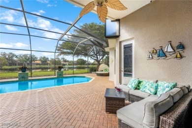 Step into this impeccably maintained Toll Brothers Saranac Floor on Estero Country Club in Florida - for sale on GolfHomes.com, golf home, golf lot