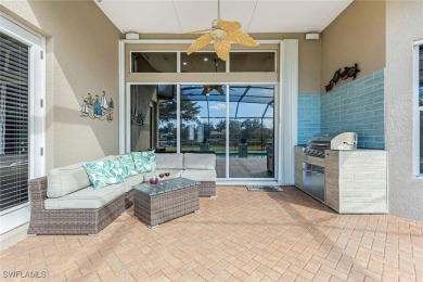 Step into this impeccably maintained Toll Brothers Saranac Floor on Estero Country Club in Florida - for sale on GolfHomes.com, golf home, golf lot