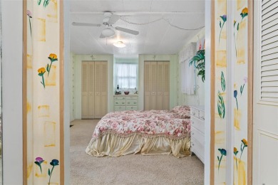 MOVE-IN READY! 2 BED/2 BATH COZY RETREAT - TWO FLORIDA ROOMS - on Bay Tree Golf Course in Florida - for sale on GolfHomes.com, golf home, golf lot