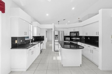 Situated in the desirable, gated community of Brookside at on Indian Spring Golf and Country Club in Florida - for sale on GolfHomes.com, golf home, golf lot