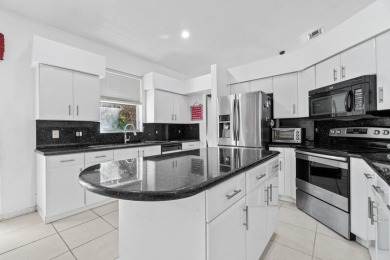 Situated in the desirable, gated community of Brookside at on Indian Spring Golf and Country Club in Florida - for sale on GolfHomes.com, golf home, golf lot