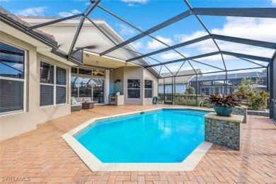 Step into this impeccably maintained Toll Brothers Saranac Floor on Estero Country Club in Florida - for sale on GolfHomes.com, golf home, golf lot