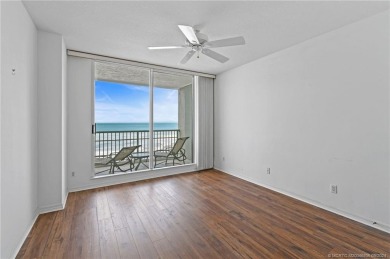 Experience breathtaking ocean views from this spacious 3-bedroom on Island Dunes Country Club in Florida - for sale on GolfHomes.com, golf home, golf lot