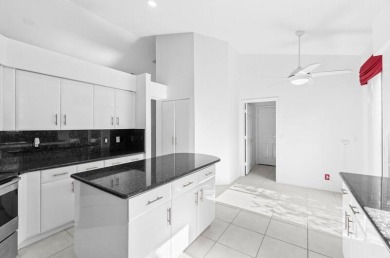 Situated in the desirable, gated community of Brookside at on Indian Spring Golf and Country Club in Florida - for sale on GolfHomes.com, golf home, golf lot