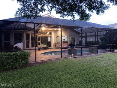 Step into this impeccably maintained Toll Brothers Saranac Floor on Estero Country Club in Florida - for sale on GolfHomes.com, golf home, golf lot