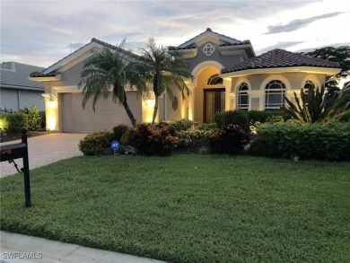 Step into this impeccably maintained Toll Brothers Saranac Floor on Estero Country Club in Florida - for sale on GolfHomes.com, golf home, golf lot