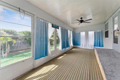 MOVE-IN READY! 2 BED/2 BATH COZY RETREAT - TWO FLORIDA ROOMS - on Bay Tree Golf Course in Florida - for sale on GolfHomes.com, golf home, golf lot