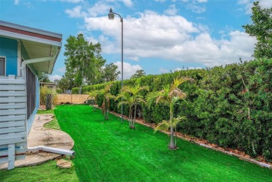 MOVE-IN READY! 2 BED/2 BATH COZY RETREAT - TWO FLORIDA ROOMS - on Bay Tree Golf Course in Florida - for sale on GolfHomes.com, golf home, golf lot