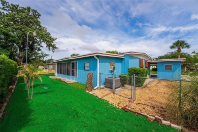 MOVE-IN READY! 2 BED/2 BATH COZY RETREAT - TWO FLORIDA ROOMS - on Bay Tree Golf Course in Florida - for sale on GolfHomes.com, golf home, golf lot