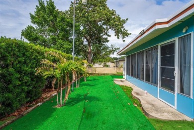 MOVE-IN READY! 2 BED/2 BATH COZY RETREAT - TWO FLORIDA ROOMS - on Bay Tree Golf Course in Florida - for sale on GolfHomes.com, golf home, golf lot