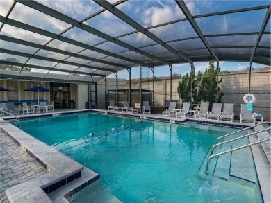 MOVE-IN READY! 2 BED/2 BATH COZY RETREAT - TWO FLORIDA ROOMS - on Bay Tree Golf Course in Florida - for sale on GolfHomes.com, golf home, golf lot