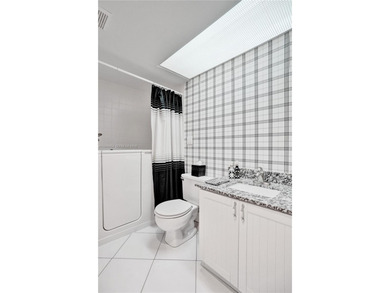 Don't walk but run to this lovely, remodeled 2/2 condo on Flamingo Lakes Country Club in Florida - for sale on GolfHomes.com, golf home, golf lot