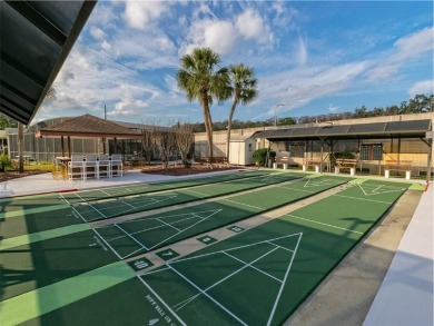 MOVE-IN READY! 2 BED/2 BATH COZY RETREAT - TWO FLORIDA ROOMS - on Bay Tree Golf Course in Florida - for sale on GolfHomes.com, golf home, golf lot