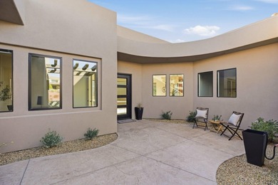 As you are welcomed into your tucked-in private entry courtyard on The Ledges Golf Club in Utah - for sale on GolfHomes.com, golf home, golf lot