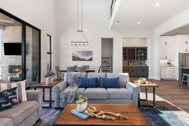 Premier Lake LBJ waterfront living inside the gated Legends on Legends Golf Course in Texas - for sale on GolfHomes.com, golf home, golf lot