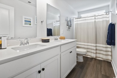 Better than new and loaded with high-end upgrades! This stunning on Wild Wing Plantation in South Carolina - for sale on GolfHomes.com, golf home, golf lot