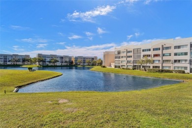 Boasting 1,420 square feet of living space, the condo features a on Sunrise Lakes Phase IV Golf Course in Florida - for sale on GolfHomes.com, golf home, golf lot