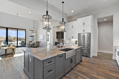 Premier Lake LBJ waterfront living inside the gated Legends on Legends Golf Course in Texas - for sale on GolfHomes.com, golf home, golf lot