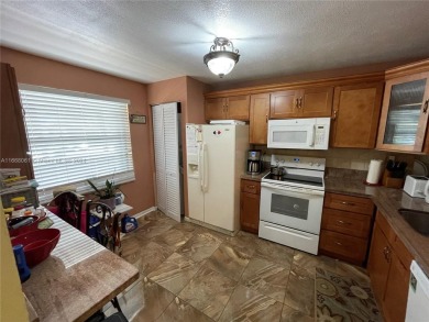 Welcome to this beautifully updated 2-bedroom, 2-bath apartment on Pembroke Lakes Golf Club in Florida - for sale on GolfHomes.com, golf home, golf lot