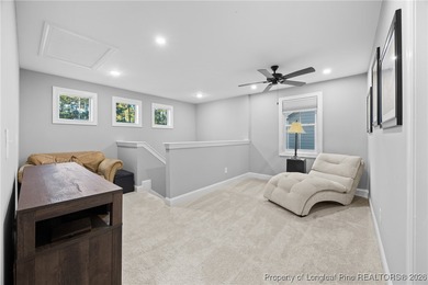 Welcome home to this well-maintained 4-bedroom, 2.5-bath on Woodlake Country Club in North Carolina - for sale on GolfHomes.com, golf home, golf lot