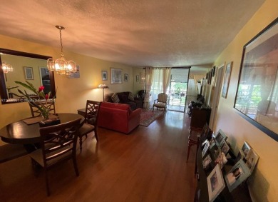 Welcome to this beautifully updated 2-bedroom, 2-bath apartment on Pembroke Lakes Golf Club in Florida - for sale on GolfHomes.com, golf home, golf lot