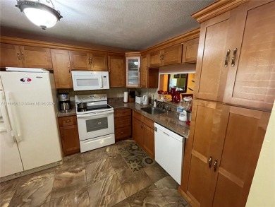 Welcome to this beautifully updated 2-bedroom, 2-bath apartment on Pembroke Lakes Golf Club in Florida - for sale on GolfHomes.com, golf home, golf lot