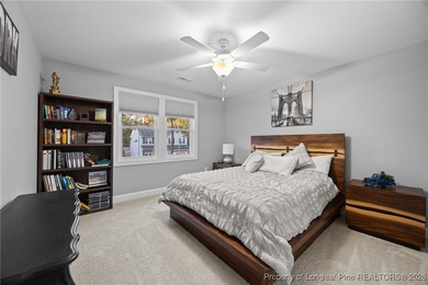 Welcome home to this well-maintained 4-bedroom, 2.5-bath on Woodlake Country Club in North Carolina - for sale on GolfHomes.com, golf home, golf lot