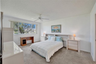 Boasting 1,420 square feet of living space, the condo features a on Sunrise Lakes Phase IV Golf Course in Florida - for sale on GolfHomes.com, golf home, golf lot