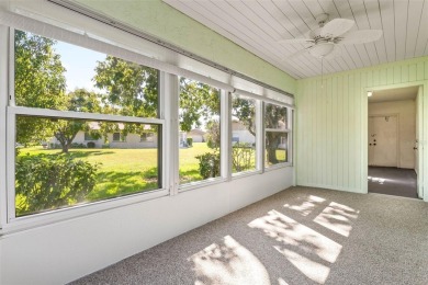 Enjoy easy living in this charming 2-bedroom, 2-bath end unit on Kings Point Executive Golf Course in Florida - for sale on GolfHomes.com, golf home, golf lot