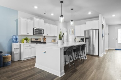 Better than new and loaded with high-end upgrades! This stunning on Wild Wing Plantation in South Carolina - for sale on GolfHomes.com, golf home, golf lot