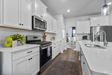 Better than new and loaded with high-end upgrades! This stunning on Wild Wing Plantation in South Carolina - for sale on GolfHomes.com, golf home, golf lot