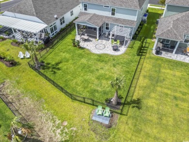 Better than new and loaded with high-end upgrades! This stunning on Wild Wing Plantation in South Carolina - for sale on GolfHomes.com, golf home, golf lot